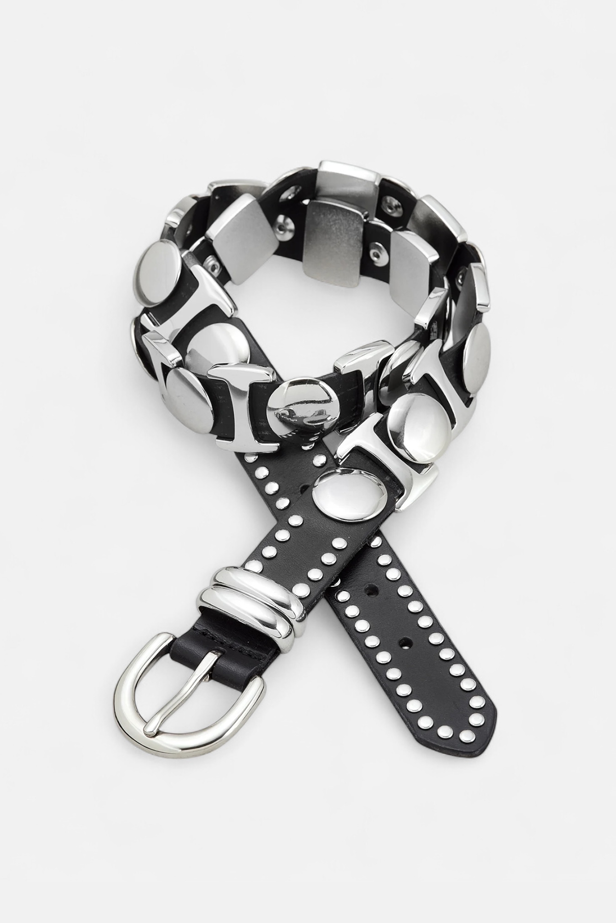Coiled Maddox black studded leather belt with polished silver buckle and studs visible.