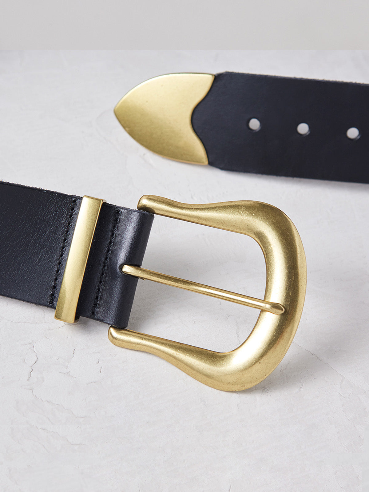 Close-up of the Maylee black belt highlighting gold buckle detail.