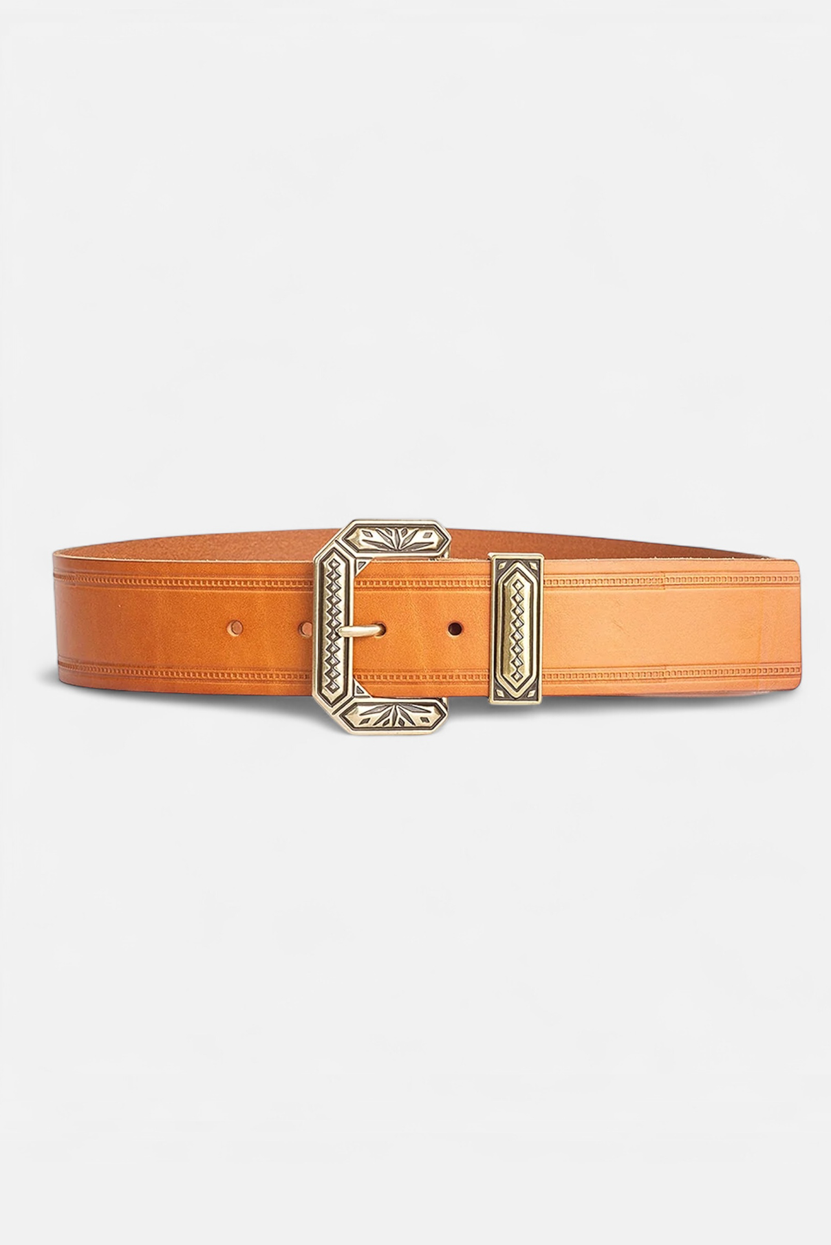 Nola vachetta leather waist belt displayed rolled to show gold hardware detailing.