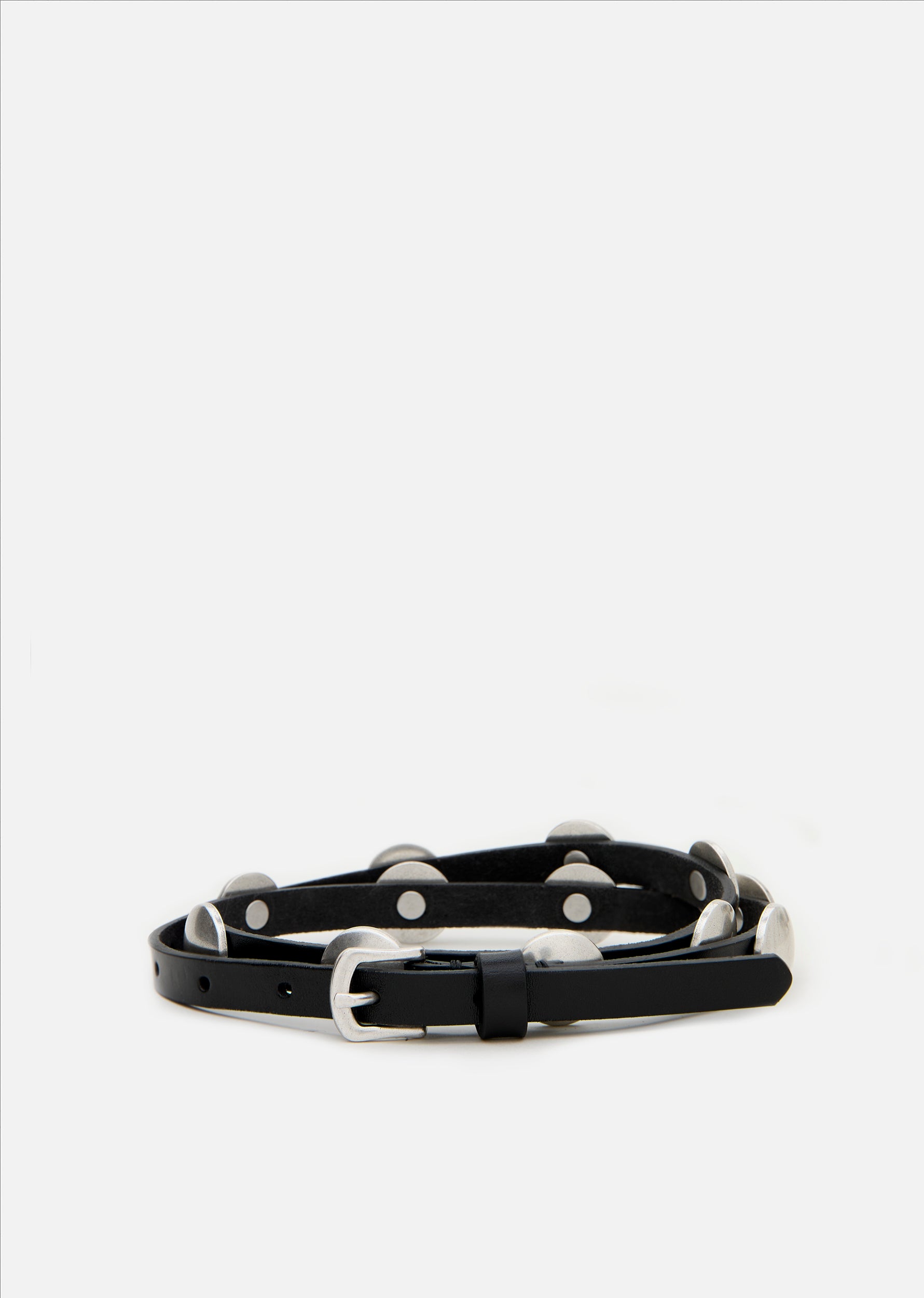 Shai black vintage leather belt displayed coiled to show silver hardware.