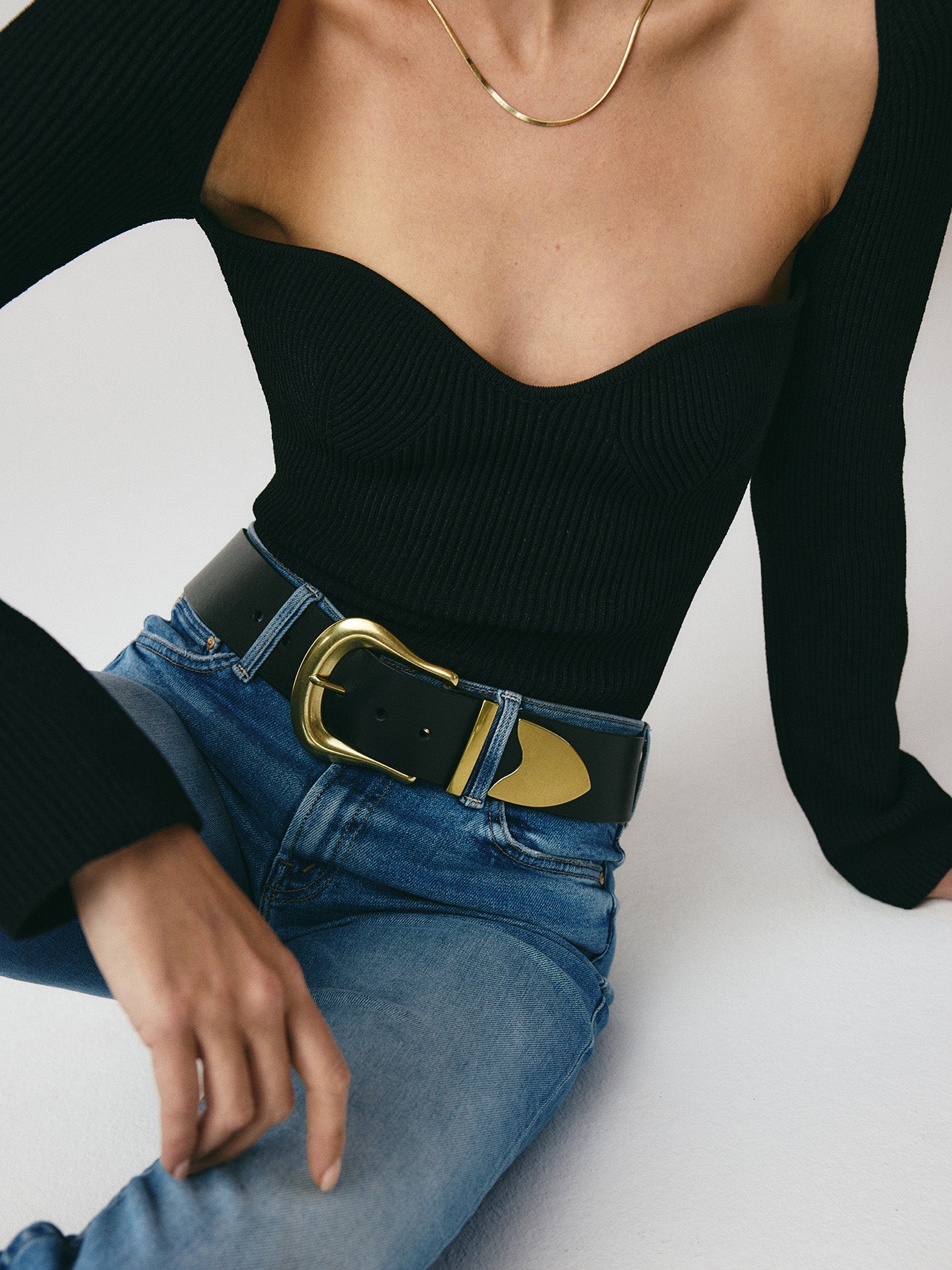 Styled outfit featuring the Maylee black leather belt.