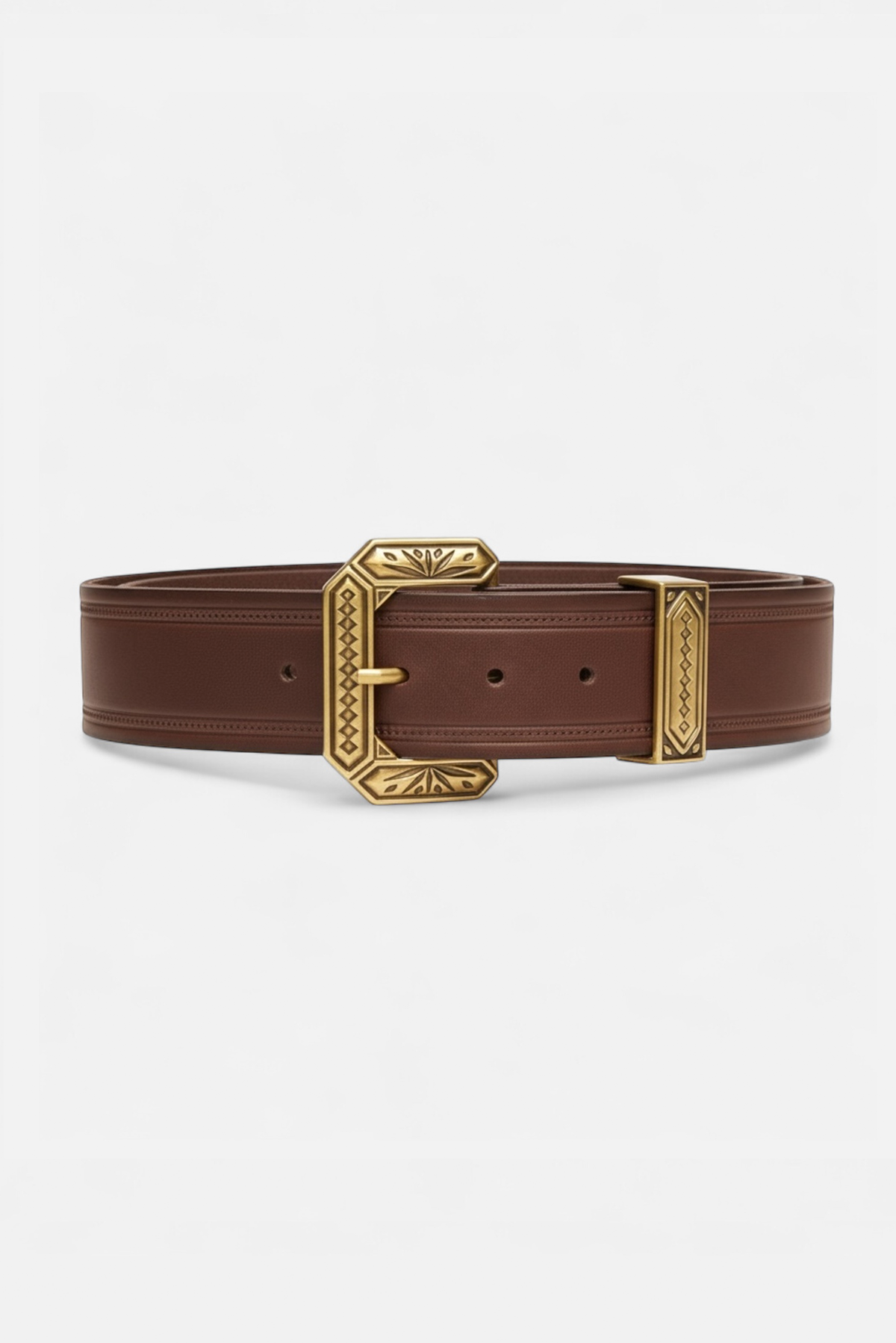 Close-up of the Nola dark brown leather belt highlighting engraved gold buckle and keeper.
